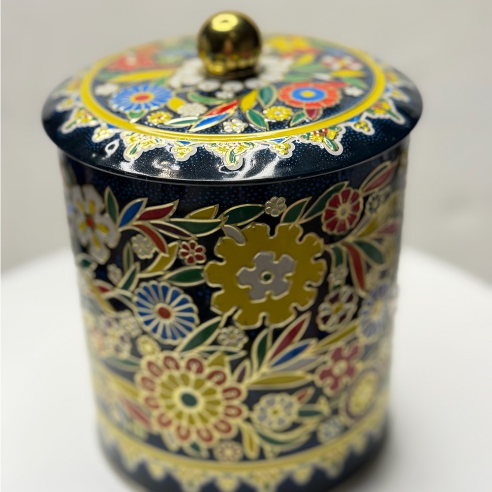 Vintage metal container with lid from Daher, made in England.